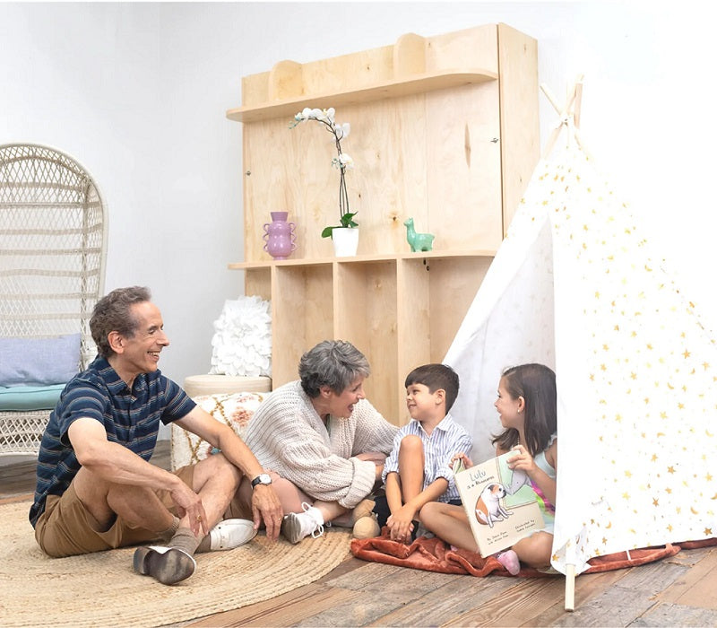 Happy family in a playroom with a murphy bed